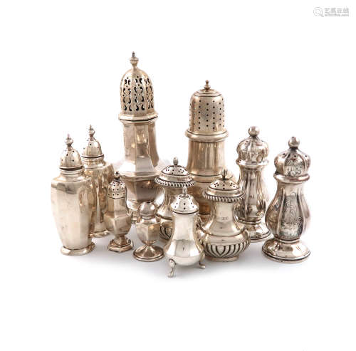 A mixed lot of silver condiments, various dates and makers, comprising: a sugar caster by Walker and