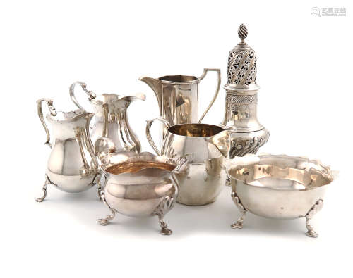 A mixed lot of silver items, various dates and makers, comprising: a George II cream jug, maker's