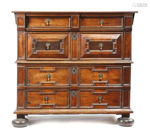 A CHARLES II OAK AND EXOTIC WOOD CHEST LATE 17TH CENTURY in two halves, with four long drawers