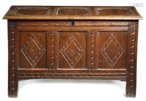 A CHARLES II OAK TRIPLE PANELLED COFFER LATE 17TH CENTURY the hinged top revealing an interior