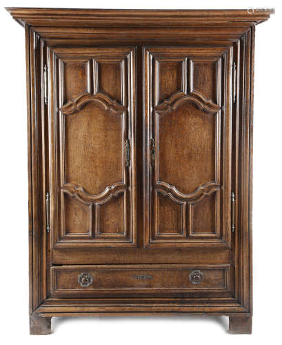 AN 18TH CENTURY FRENCH OAK ARMOIRE POSSIBLY NORMANDY with a moulded detachable cornice above a