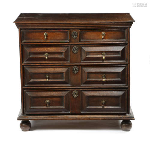 A WILLIAM AND MARY OAK CHEST LATE 17TH CENTURY of two short and three long drawers with panelled