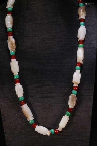 A HETIAN JADE STRING NECKLACE