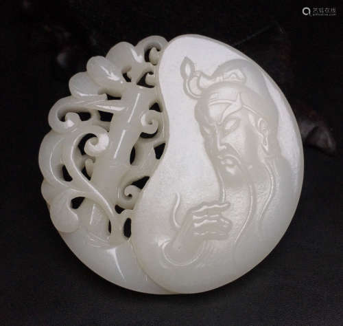 A HETIAN JADE PENDANT CARVED WITH GUANGONG PATTERN