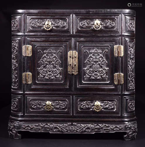 A ZITAN WOOD CABINET CARVED WITH DRAGON PATTERN