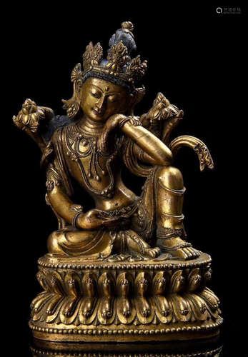 A GILT BRONZE GUANYIN BUDDHA