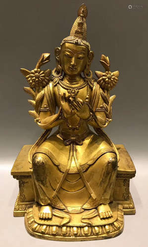 A GILT BRONZE MAITREYA