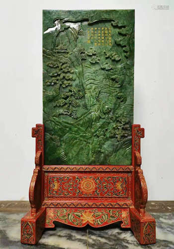A LACQUER GREEN JADE SCREEN CARVED WITH FIGURE OUTLINE IN GOLD