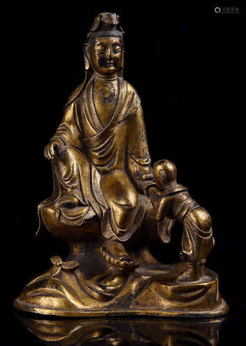 A GILT BRONZE GUANYIN BUDDHA