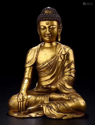 A GILT BRONZE BUDDHA