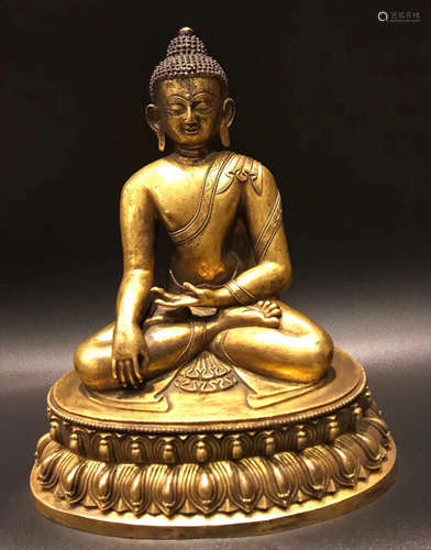 A GILT BRONZE SAKYAMUNI BUDDHA