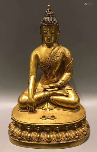 A GILT BRONZE SAKYAMUNI BUDDHA