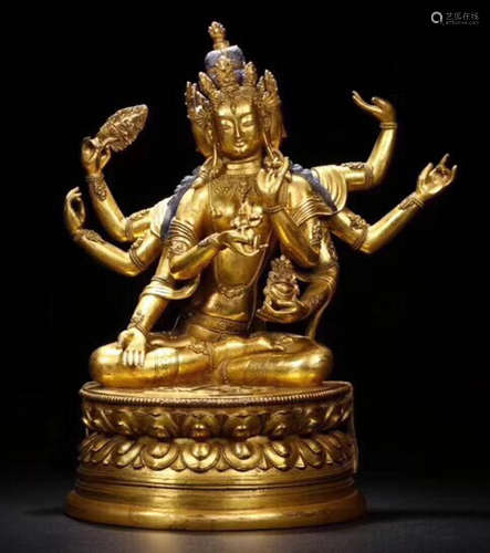 A GILT BRONZE TARA