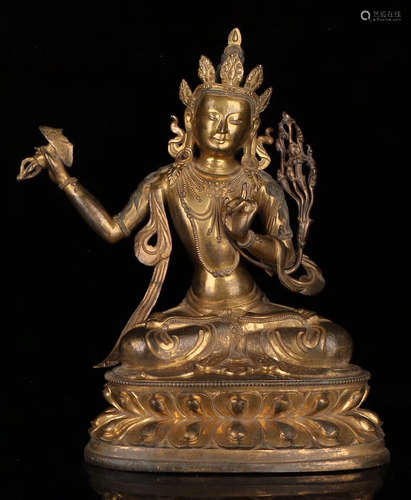 A GILT BRONZE MANJUSRI