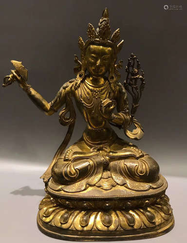 A GILT BRONZE MANJUSRI