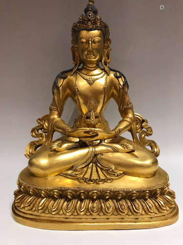 A GILT BRONZE INFINTE LIFE BUDDHA