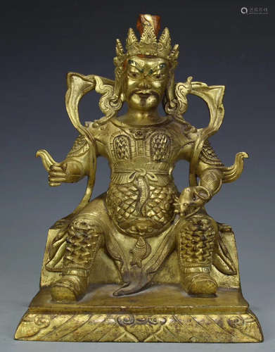 A GILT BRONZE CAISHEN BUDDHA