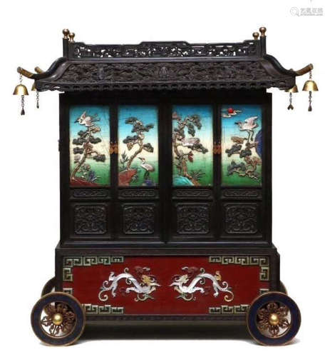 A ZITAN WOOD WITH LACQUER CARVED CARRIAGE WITH PINE AND CRANE PATTERN