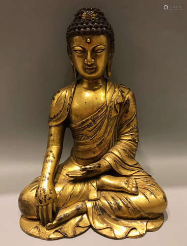 A GILT BRONZE SAKYAMUNI BUDDHA