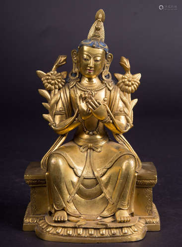 A GILT BRONZE MANJUSRI