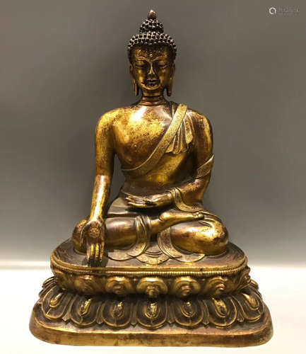 A GILT BRONZE SAKYAMUNI BUDDHA