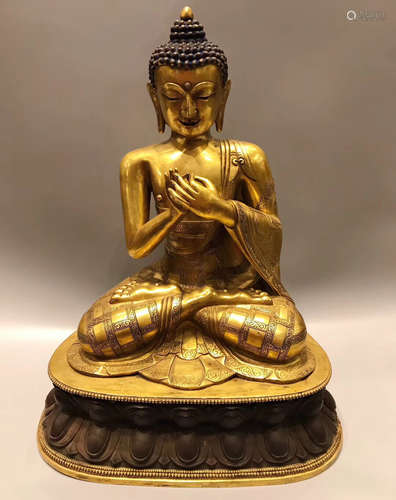 A GILT BRONZE SAKYAMUNI BUDDHA