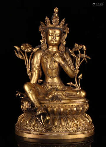 A GILT BRONZE MANJUSRI