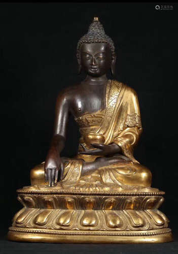 A GILT BRONZE PHARMACIST