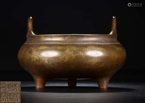 A COPPER CENSER WITH EARS