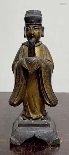 A GILT BRONZE WENGUAN FIGURE