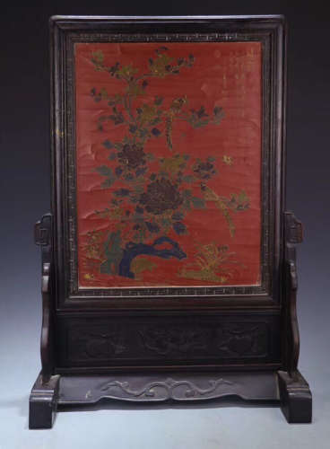 A LACQUER SCREEN WITH CARVING