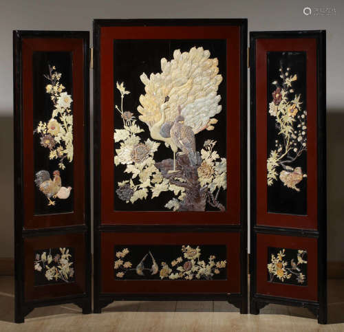 A BLACK LACQUER SCREEN WITH FLOWER AND BIRD PATTERN