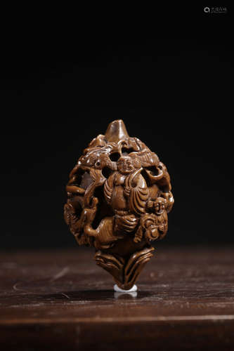 A Chinese Carved Nucleus Ornament