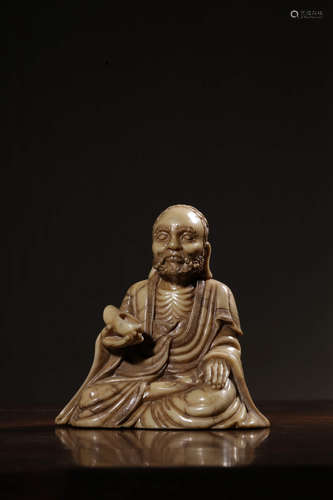 A Chinese Carved Shoushan Stone Arhat Seated Statue