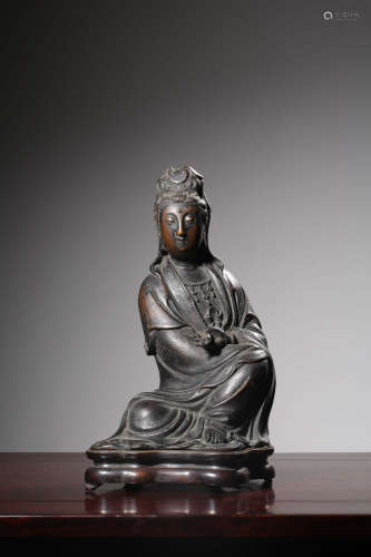 A Chinese Copper Seated Guanyin Statue with pedestal