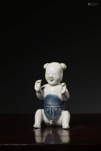 A Chinese White Glaze Blue and White Porcelain Boy Statue