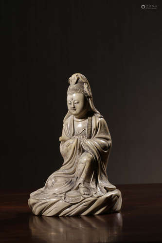 A Chinese Carved Shoushan Stone Seated Guanyin Statue