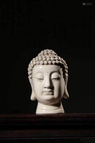 A Chinese White Glazed Porcelain Buddha'a Head