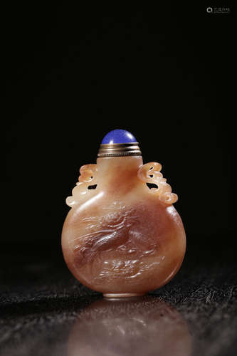 A Chinese Carved Hetian Jade Snuff Bottle