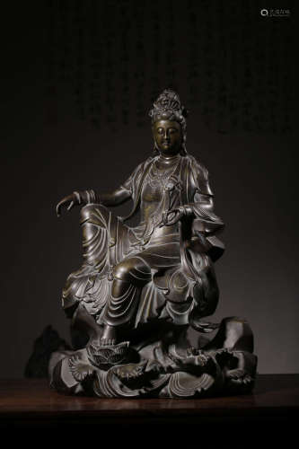 A Chinese Copper Guanyin Statue