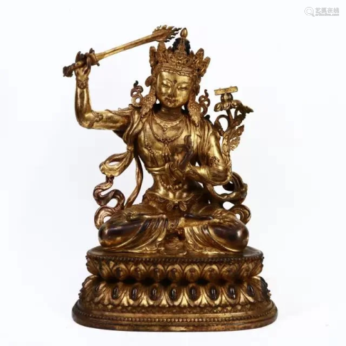 A CHINESE GILD COPPER STATUE OF MANJ…