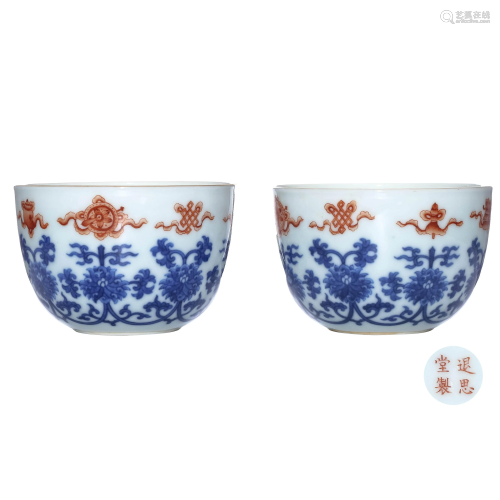 A PAIR OF CHINESE BLUE AND WHITE IRON R…