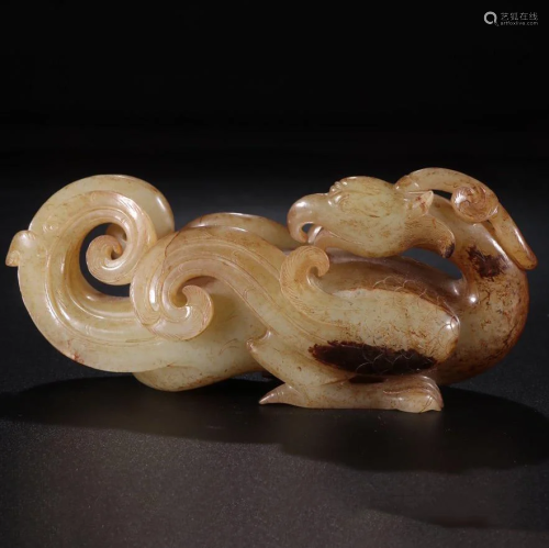 A CHINESE CARVED HETIAN JADE BIRD ORNA…