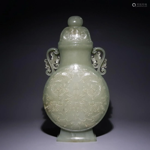A CHINESE FLORAL CARVED HETIAN JADE VASE