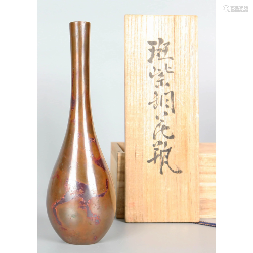 A CHINESE RED COPPER FLOWER VASE