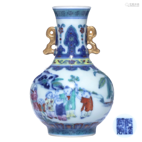 A CHINESE BLUE AND WHITE DOUCAI FIG…