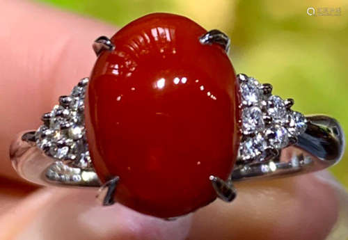 A PLATINUM WITH JAPANESE AKA CORAL DIAMOND RING