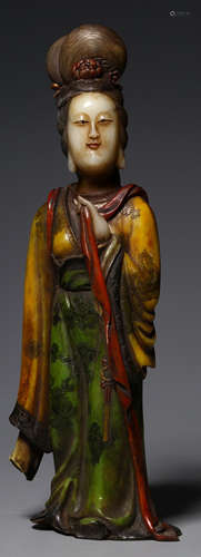 A SOAPSTONE CARVED FIGURE SHAPED STATUE