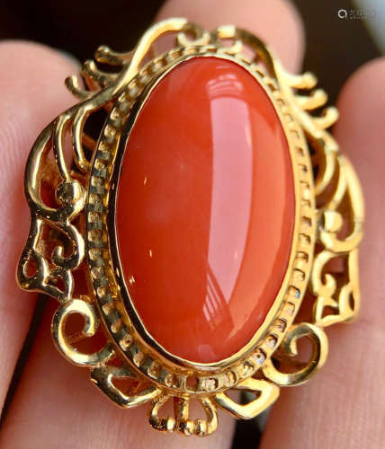 A PLATINUM WITH CORAL RING