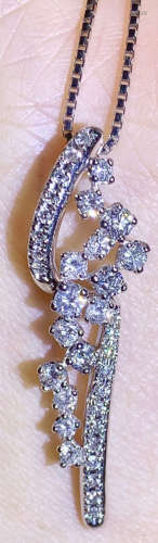 A PLATINUM WITH DIAMOND PENDANT